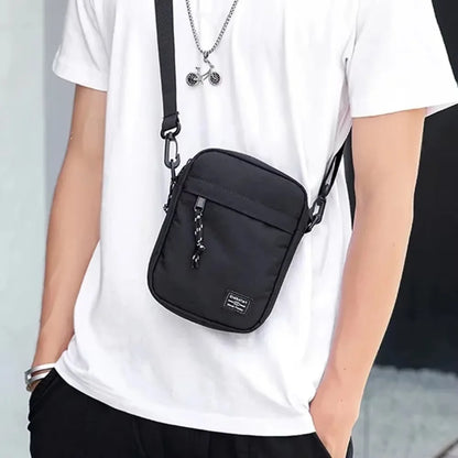 Petit sac à bandoulière simple et décontracté pour hommes en nylon Sac à bandoulière homme en tissu Oxford Sac messager de téléphone Sac de poitrine pour mari