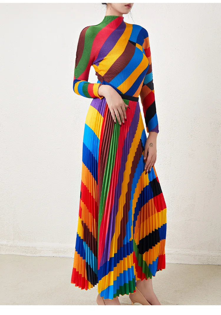 Fashionable two-piece set for women: pleated rainbow print long-sleeved top and high-waisted versatile skirt.