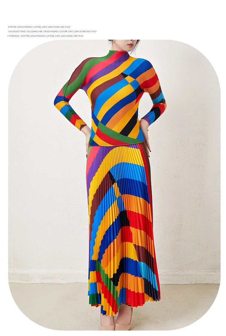 Fashionable two-piece set for women: pleated rainbow print long-sleeved top and high-waisted versatile skirt.