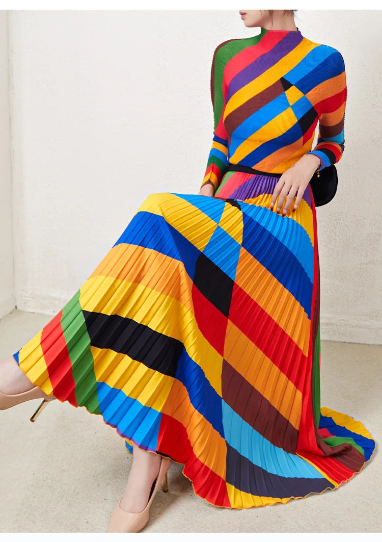Fashionable two-piece set for women: pleated rainbow print long-sleeved top and high-waisted versatile skirt.